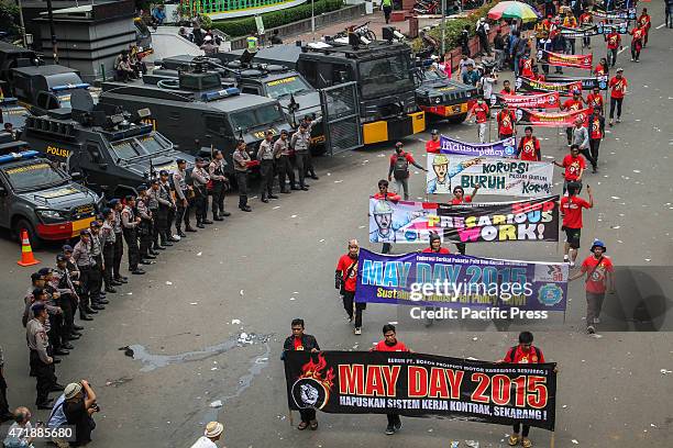 Indonesian workers march down the street to mark May Day. Unions would be out in force to demand better working conditions in Southeast Asia's most...