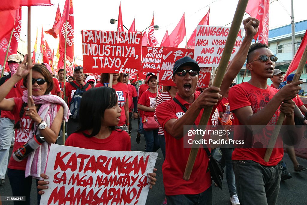 Protesters chant and shout while they march towards Mendiola...