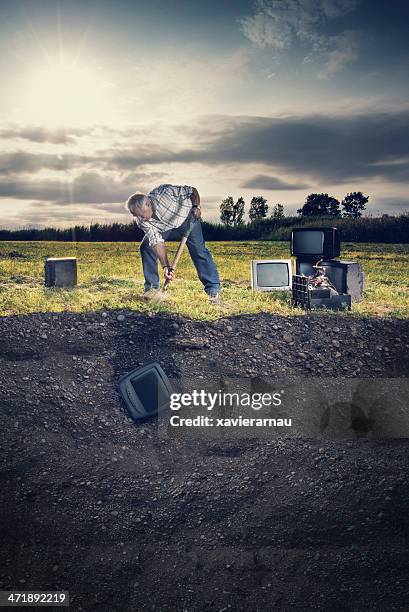 burying memories - digging hole stock pictures, royalty-free photos & images