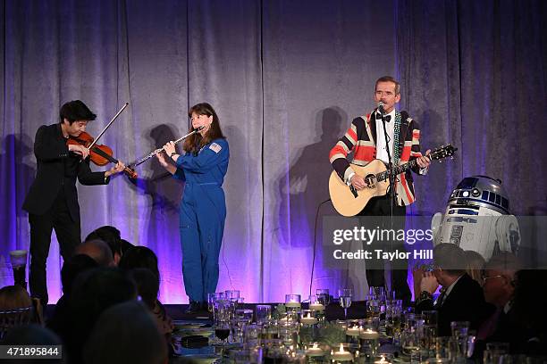 Violinist Charles Yang, astronaut Cady Coleman, and astronaut Chris Hadfield perform during Genius Gala 4.0 at Liberty Science Center on May 1, 2015...