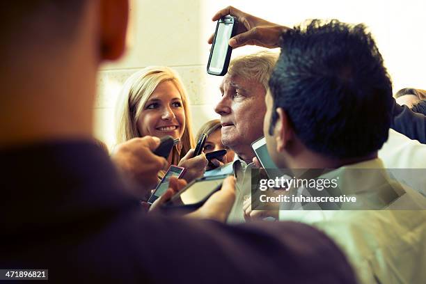 reporters getting the interview - press & vip stock pictures, royalty-free photos & images