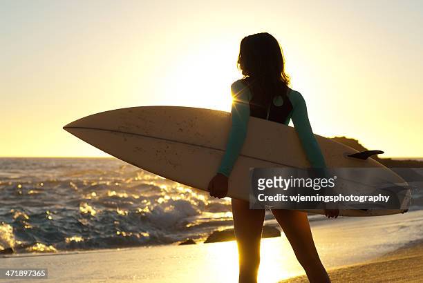 surfer girl silhouette - laguna beach california stock pictures, royalty-free photos & images