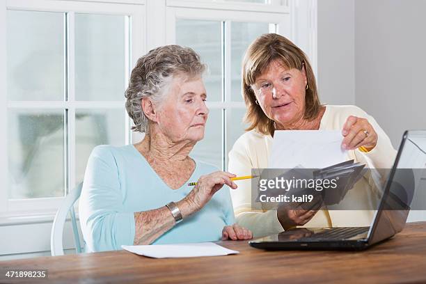paying bills - social security stock pictures, royalty-free photos & images