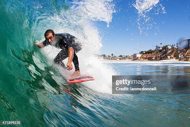 surfing - surfer wetsuit stock pictures, royalty-free photos & images