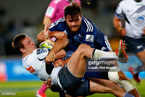 Dane Haylett Petty of the Westen Force is tackled during the round 12 Super Rugby match between the Blues and the Force at Eden Park on May 2, 2015...