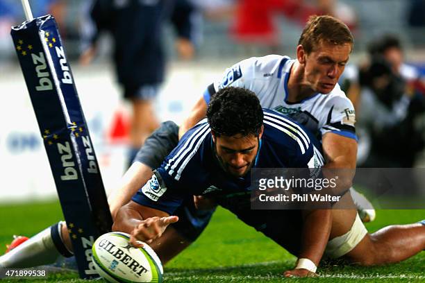 Ikira Ioane of the Blues scores a try during the round 12 Super Rugby match between the Blues and the Force at Eden Park on May 2, 2015 in Auckland,...