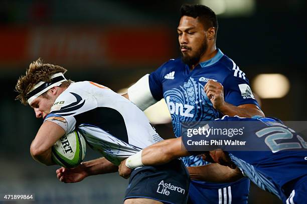 Kyle Godwin of the Western Force is tackled during the round 12 Super Rugby match between the Blues and the Force at Eden Park on May 2, 2015 in...