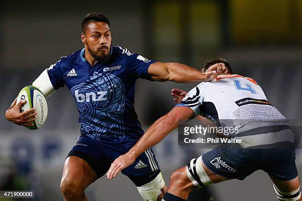 George Moala of the Blues is tackled during the round 12 Super Rugby match between the Blues and the Force at Eden Park on May 2, 2015 in Auckland,...