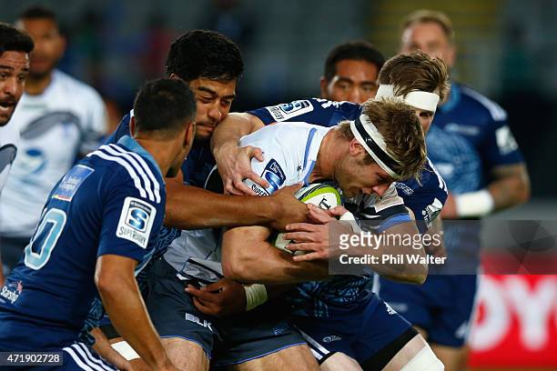 Kyle Godwin of the Western Force is tackled during the round 12 Super Rugby match between the Blues and the Force at Eden Park on May 2, 2015 in...