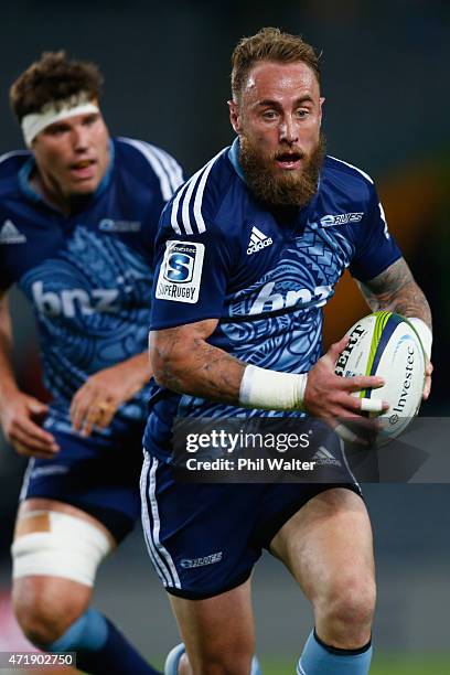 Jimmy Cowan of the Blues runs the ball during the round 12 Super Rugby match between the Blues and the Force at Eden Park on May 2, 2015 in Auckland,...