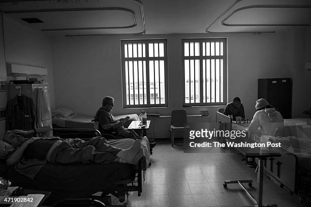 Younger inmates at Devens federal prison share a room with elderly prisoners in Massachusetts, on Tuesday, April 21, 2015. Inmates serve as companion...