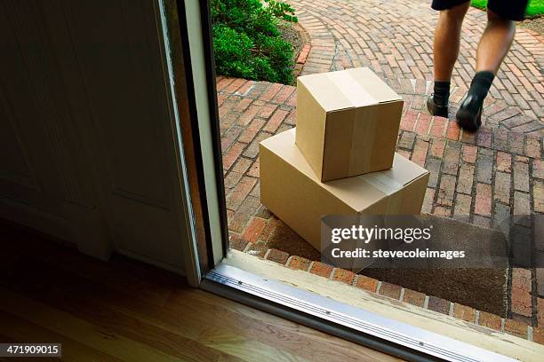 delivery - doormat stock pictures, royalty-free photos & images