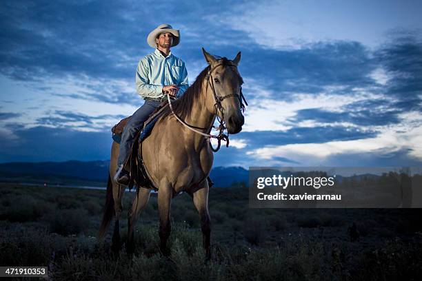 cowboy at dusk - montana western usa stockfoto's en -beelden