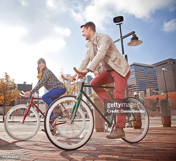 urban cyclists - denver summer stock pictures, royalty-free photos & images