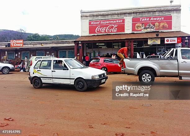 familiar coca-cola sign in tiny, remote south african town - limpopo province stock pictures, royalty-free photos & images