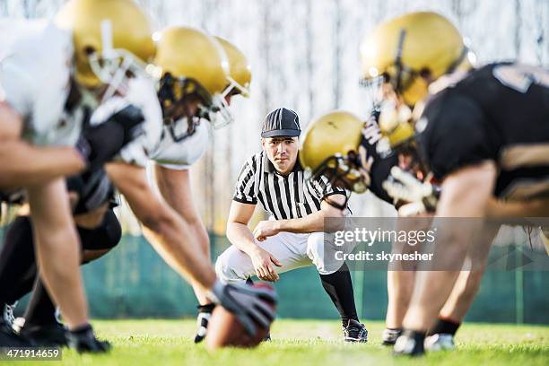 american football players positioning. - american football referee stock pictures, royalty-free photos & images