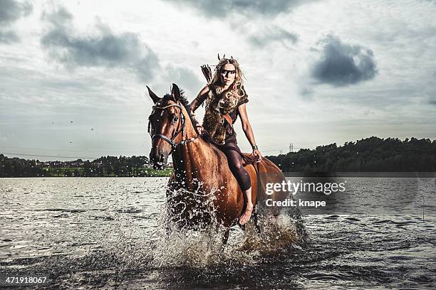 beautiful elf warrior princess with her horse - woman bowing stock pictures, royalty-free photos & images