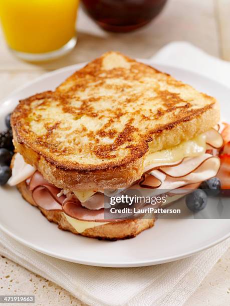 classic monte cristo sandwich - pain perdu stock pictures, royalty-free photos & images