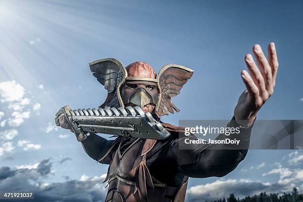 winged hero with sword - super excited suit stock pictures, royalty-free photos & images