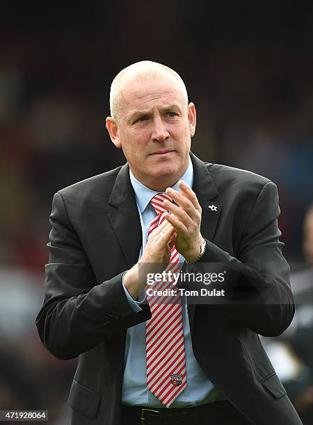 Brentford Manager Mark Warburton salutes the fans during the Sky Bet Championship match between Brentford and Wigan Athletic at Griffin Park on May...