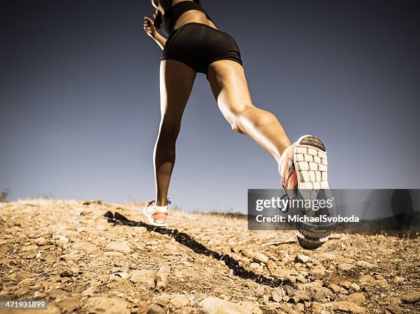hillside runner - schuhsohle stock-fotos und bilder