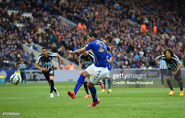 Leonardo Ulloa of Leicester City scores his team's third goal from the penalty spot during the Barclays Premier League match between Leicester City...