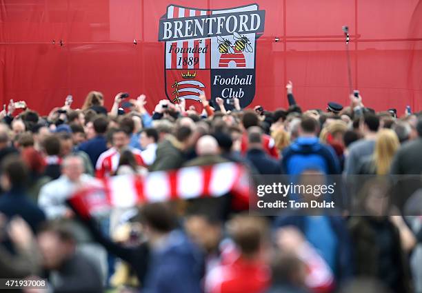 Brentford logo is pictured during a pitch invasion by the fans during the Sky Bet Championship match between Brentford and Wigan Athletic at Griffin...