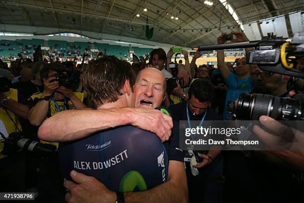 Alex Dowsett gets a hug from his father Phil after setting a new UCI Hour Record during the UCI Hour Record Attempt at the National Cycling Centre,...