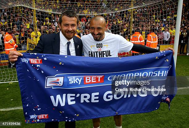 Watford Head Coach Slavisa Jokanovic and goalkeeper Heurelho Gomes celebrate promotion to the premier league after the final whistle during the Sky...