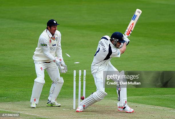 Nick Compton of Middlesex is bowled by Scott Borthwick of Durham during day one of the LV County Championship match between Middlesex and Durham at...