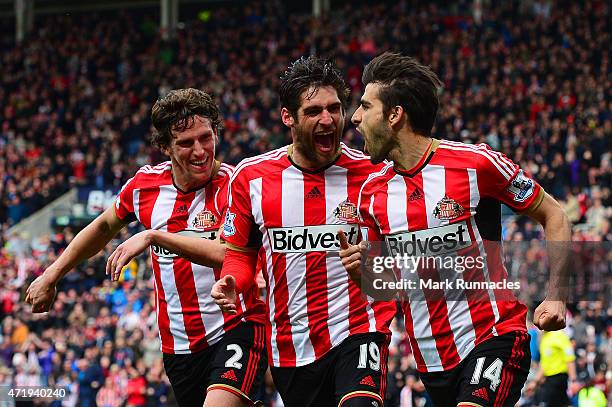 Jordi Gomez of Sunderland celebrates his penalty with Danny Graham and Billy Jones during the Barclays Premier League match between Sunderland and...