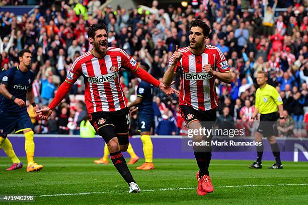 Jordi Gomez of Sunderland celebrates scoring his penalty with Danny Graham during the Barclays Premier League match between Sunderland and...