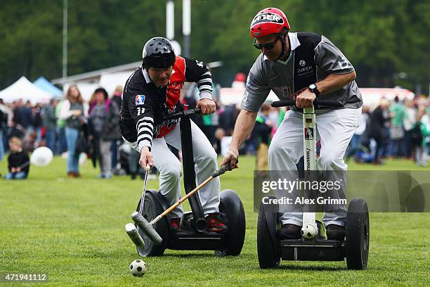 Players of Funky-Move Turtles Lohmar and X-Turtles Lohmar compete in a Segwaypolo friendly match on May 1, 2015 in Cologne, Germany.