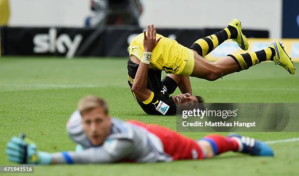 Pierre-Emerick Aubameyang of Dortmund looks for the ball after he missed to score against goalkeeper Oliver Baumann of Hoffenheim during the...