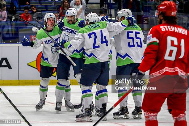 Players of Slovenia celebrate during the IIHF World Championship group B match between Belarus and Slovenia at CEZ Arena on May 2, 2015 in Ostrava,...