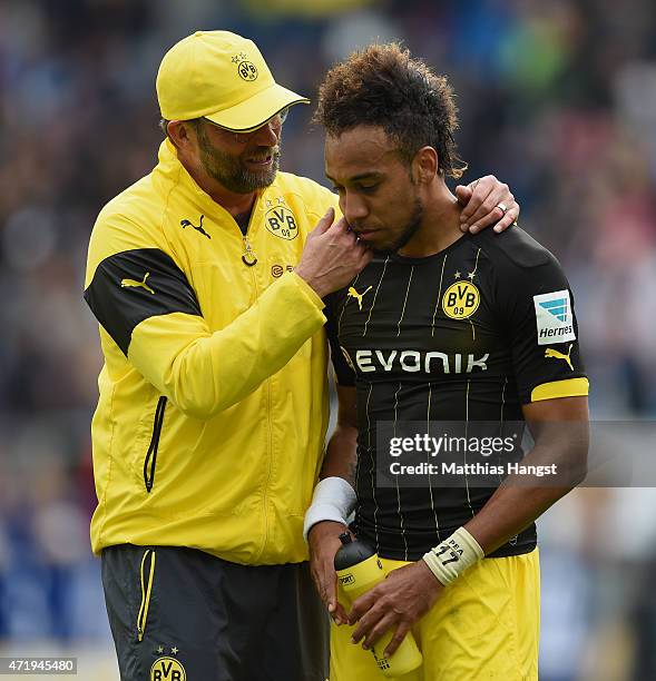 Head coach Juergen Klopp of Dortmund speaks to Pierre-Emerick Aubameyang of Dortmund after the Bundesliga match between 1899 Hoffenheim and Borussia...