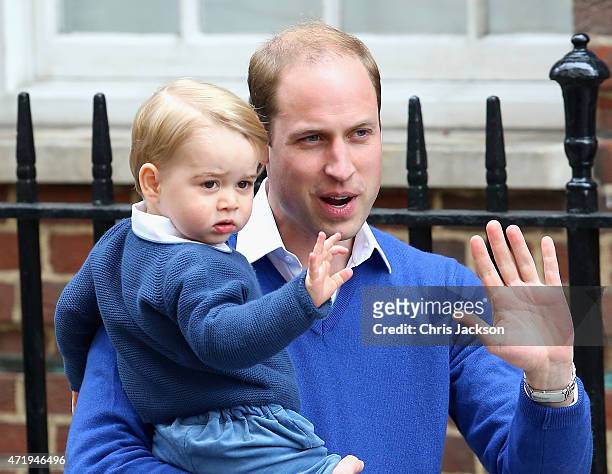 Prince William, Duke of Cambridge and Prince George of Cambridge arrive at the Lindo Wing after Catherine, Duchess of Cambridge gave birth to a baby...