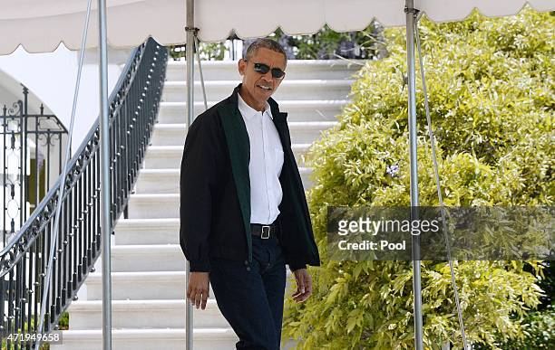 President Barack Obama walks towards Marine One on the South Lawn of the White House prior to his departure May 2, 2015 in Washington, DC. The...