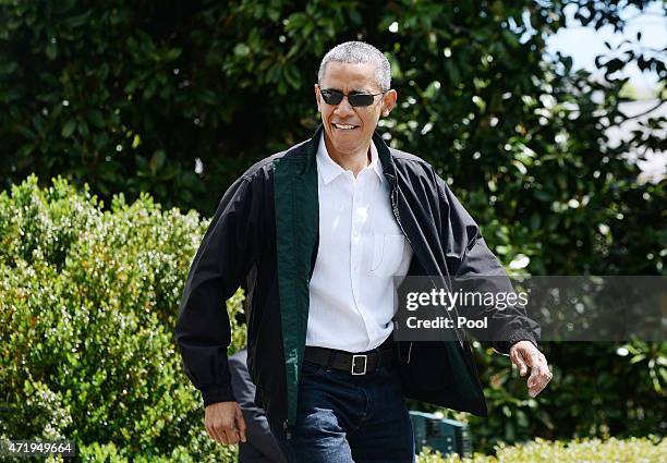 President Barack Obama walks towards Marine One on the South Lawn of the White House prior to his departure May 2, 2015 in Washington, DC. The...