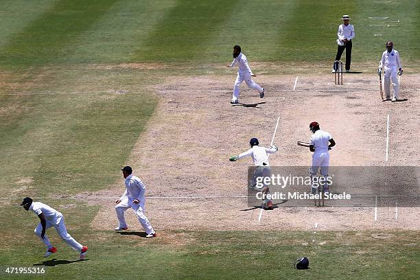 Chris Jordan of England takes a catch at 2nd slip off the bowling of Moeen Ali to claim the wicket of Darren Bravo of West Indies during day two of...