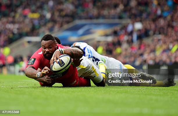 Mathieu Bastareaud of Toulon barges over to score his team's first try during the European Rugby Champions Cup Final match between ASM Clermont...