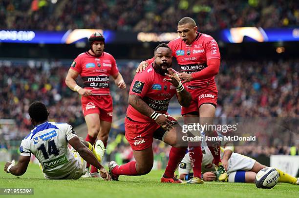 Mathieu Bastareaud of Toulon celebates with teammate Bryan Habana of Toulon after scoring his team's first try during the European Rugby Champions...