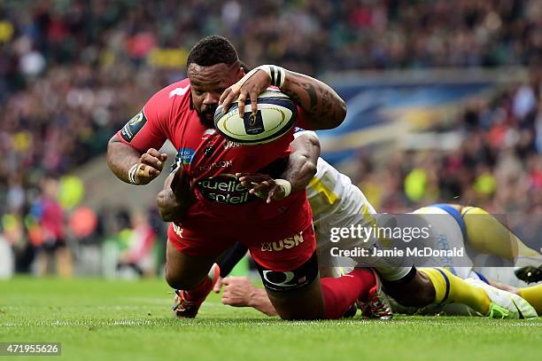 Mathieu Bastareaud of Toulon barges over to score his team's first try during the European Rugby Champions Cup Final match between ASM Clermont...