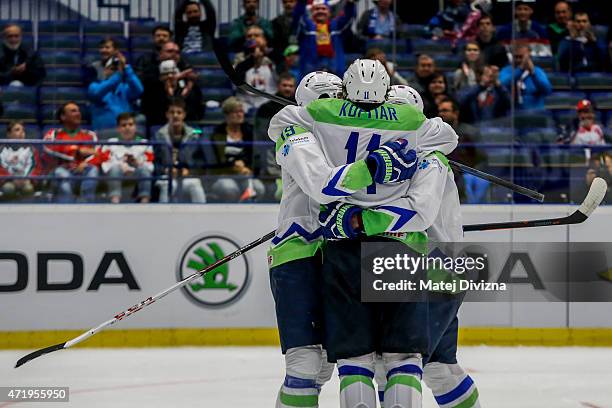 Players of Slovenia celebrate during the IIHF World Championship group B match between Belarus and Slovenia at CEZ Arena on May 2, 2015 in Ostrava,...