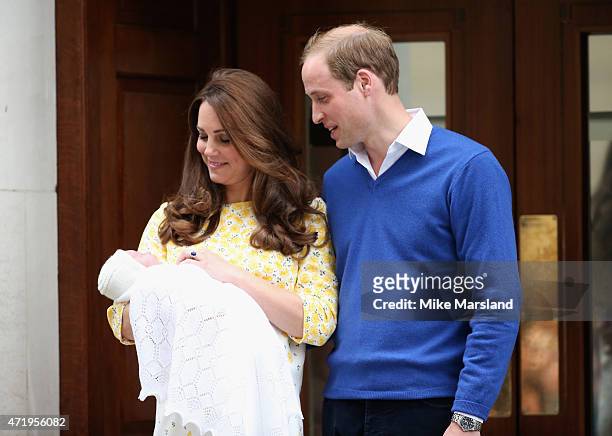Prince William, Duke of Cambridge and Catherine, Duchess Of Cambridge depart the Lindo Wing with their new baby daughter at St Mary's Hospital on May...