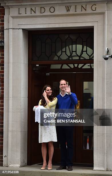 Britain's Prince William, Duke of Cambridge, and his wife Catherine, Duchess of Cambridge show their newly-born daughter, their second child, to the...
