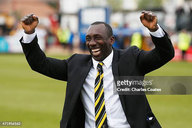 Burton Albion manager Jimmy Floyd Hasselbaink celebrates the League title after winning the Sky Bet League Two match between Cambridge United and...