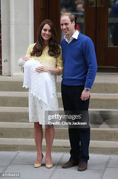 Catherine, Duchess of Cambridge and Prince William, Duke of Cambridge depart the Lindo Wing with their newborn daughter at St Mary's Hospital on May...