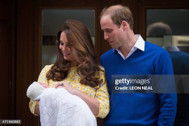 Britain's Prince William, Duke of Cambridge, and his wife Catherine, Duchess of Cambridge show their newly-born daughter, their second child, to the...