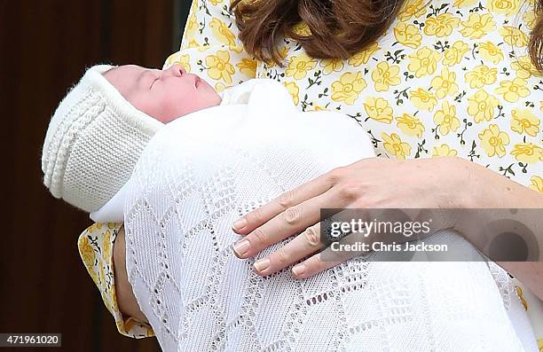 Catherine, Duchess of Cambridge and Prince William, Duke of Cambridge depart the Lindo Wing with their newborn daughter at St Mary's Hospital on May...